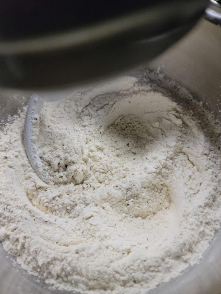 Dough hook mixing dry ingredients