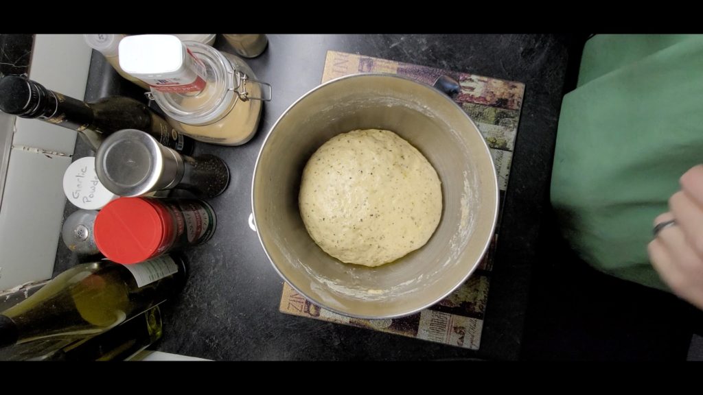 Dough ball in bowl after rising - doubling in size